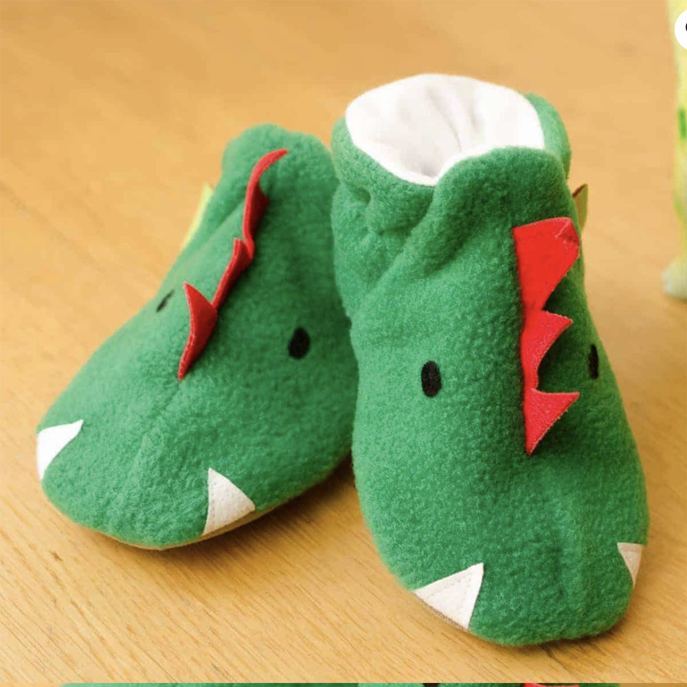 Dragón verde de pies funky